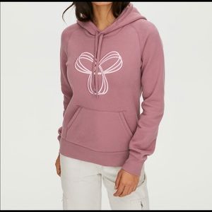 ISO tna pullover hoodie, size L or Xl in a light grey or light pink